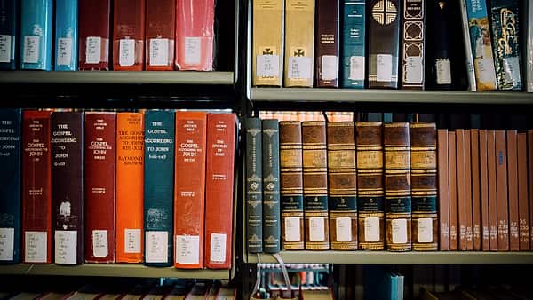 The reading room of Mt. Angel Abbey Library in Saint Benedict, Oregon, with shelving running back from an open floor