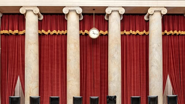 The Courtroom of the Supreme Court showing Associate Justice Ruth Bader Ginsburg’s Bench Chair and the Bench in front of her