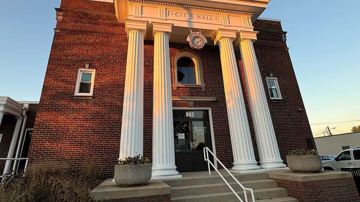 The exterior of Beech Grove City Hall, a low municipal building fronting the street with its entrance at the center